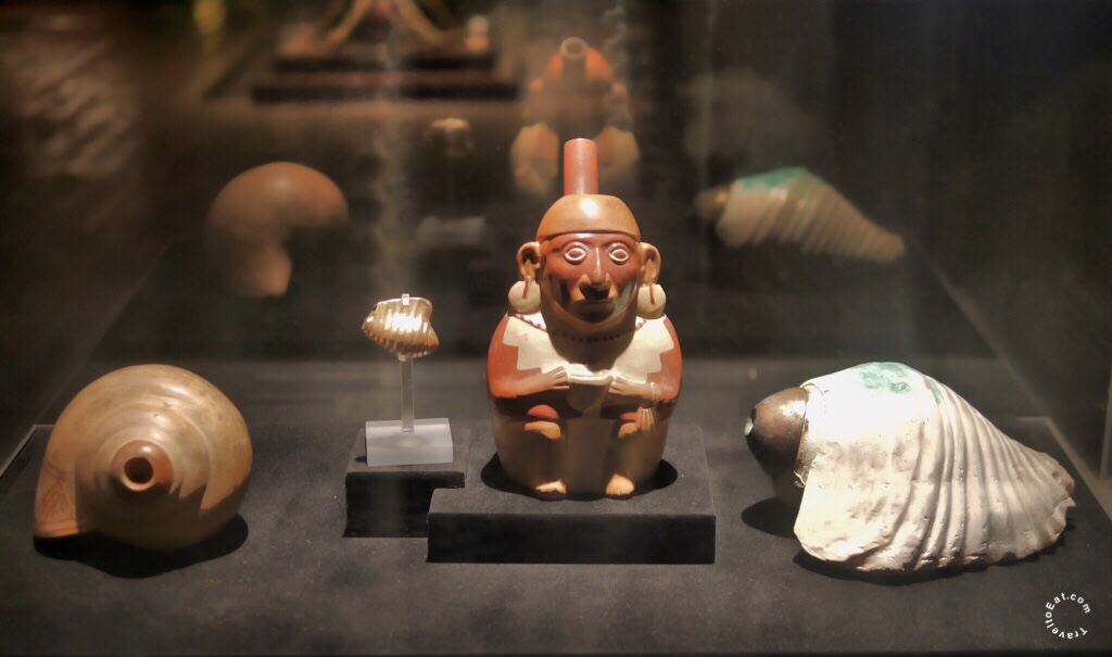 Ceramic Moche Trumpeter (center), Moche Strombus Seashell Pututo (right), Mocha Ceramic Pututo (right), Miniature Gilded Copper Strombus (center). Larco Museum, Lima