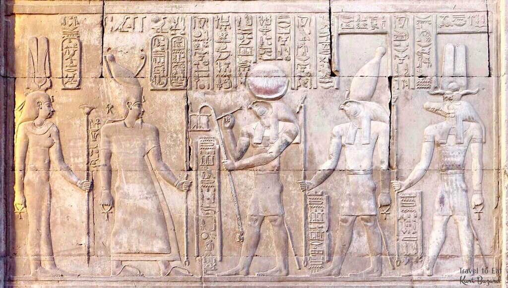 Ptolemy VI Philometor with Cleopatra I Behind Facing Haroesis, Horus and Sobek. Kom Ombo Temple Egypt