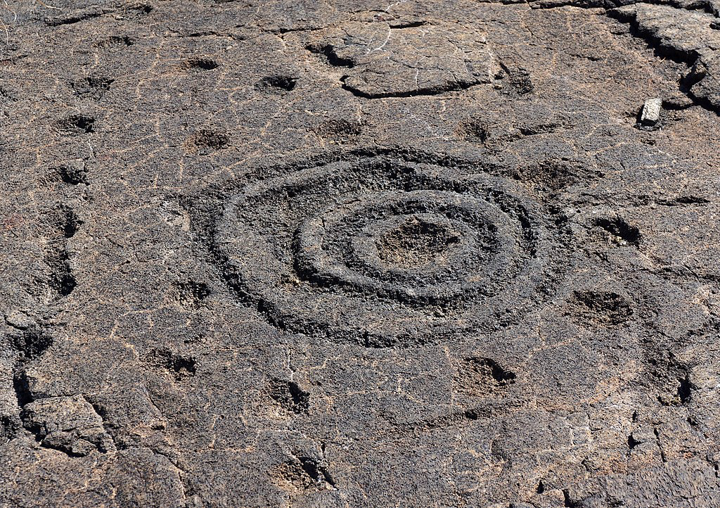 Cup and ring petroglyph in lava rock, Volcano National Park, island of Hawaii