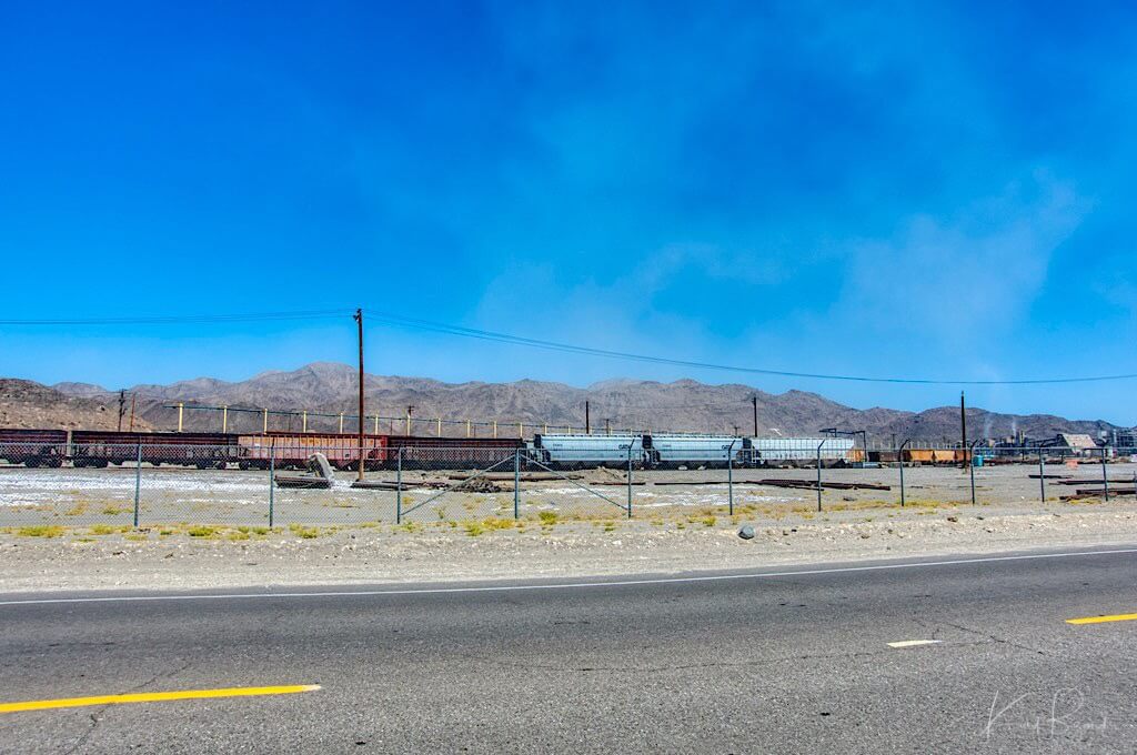 Rairoad Cars in Foreground, Argus Range in Background. Trona California